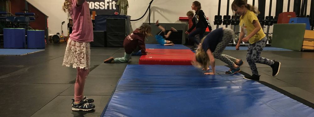 Kids on the blue mats