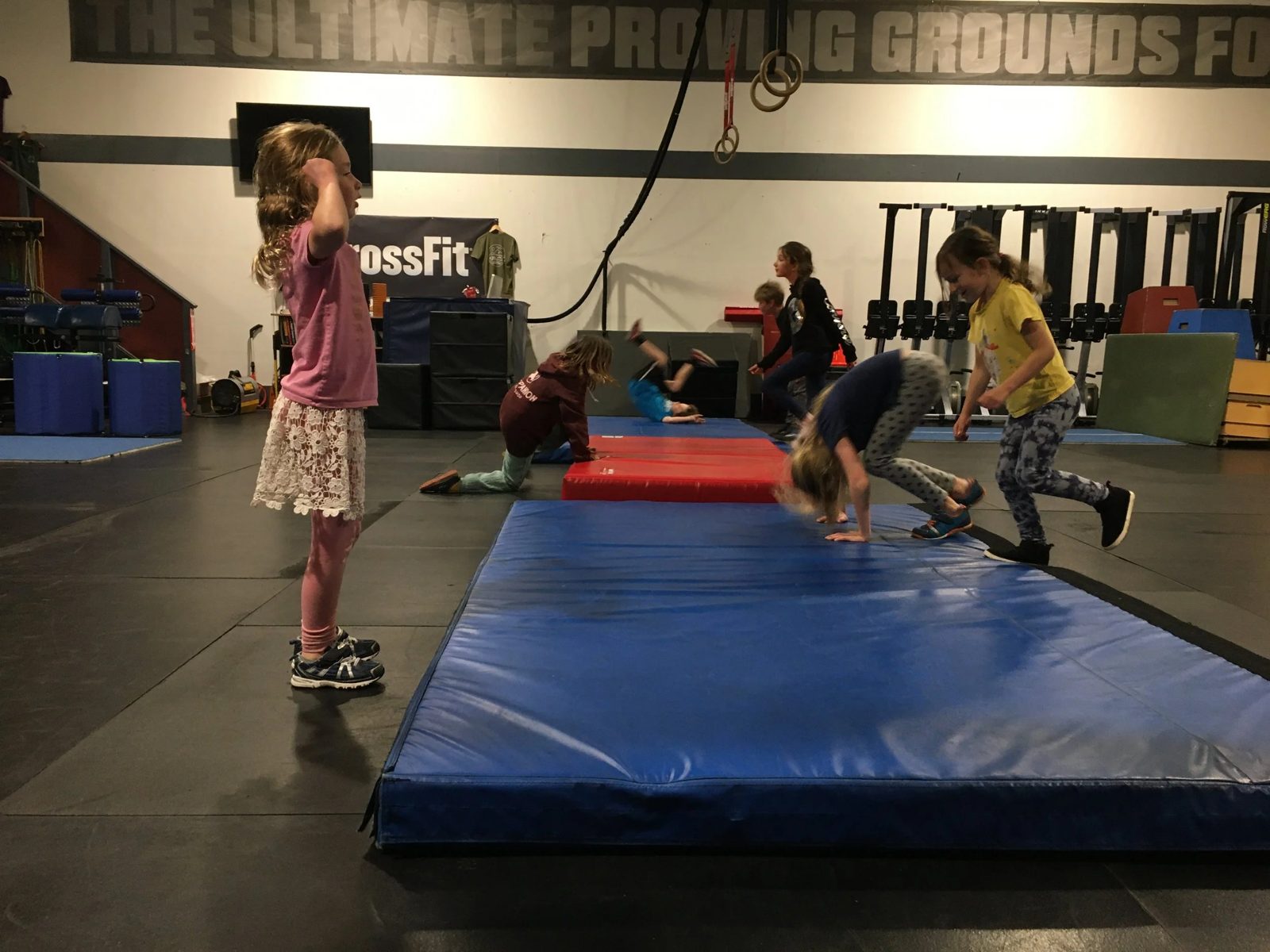 Girls gymnastics class on the mats